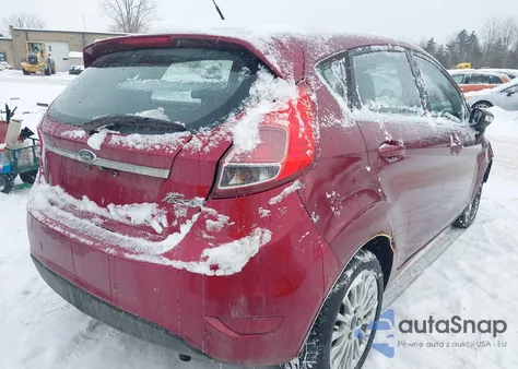 2014 Ford Fiesta Titanium z USA, uszkodzony, nr VIN 3FADP4FJ0EM162936